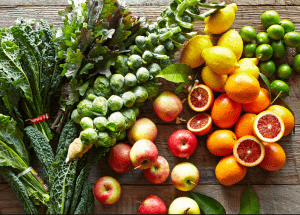 a group of fruits and vegetables on a wood surface Healthy Weight Loss Diets Somerset